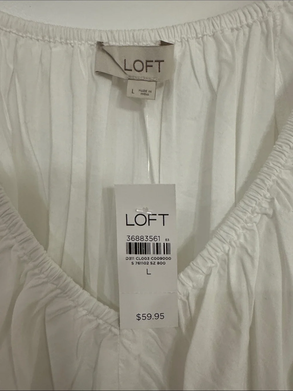 LOFT White Peplum Blouse with Puff Sleeves